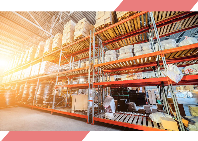 A warehouse with many shelves filled with boxes.