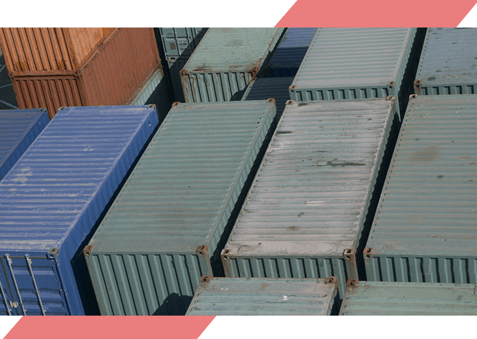 A bunch of cargo containers are stacked together